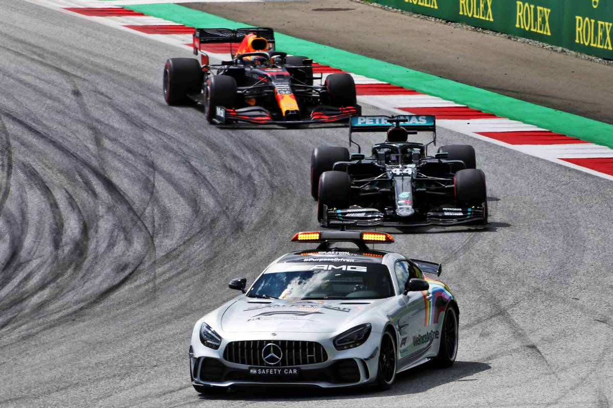 Lewis Hamilton (GBR) Mercedes AMG F1 W11 leads behind the FIA Safety Car.